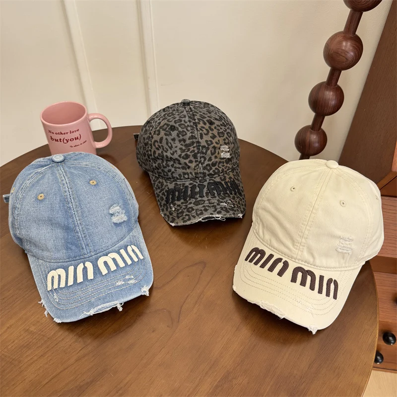 Damen Baseball Cap mit Grafik im Used-Look Skanto