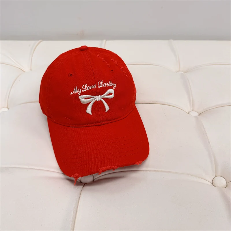 Damen Baseball Cap aus gewaschener Baumwolle mit Schleifenstickerei Skanto