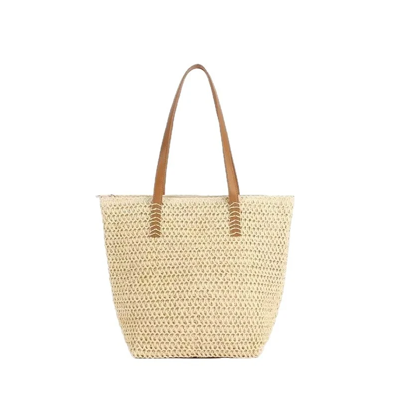 Handtasche aus gewebtem Naturmaterial mit Ledergriffen Skanto