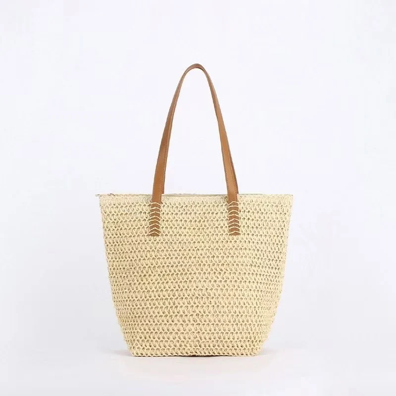Handtasche aus gewebtem Naturmaterial mit Ledergriffen Skanto