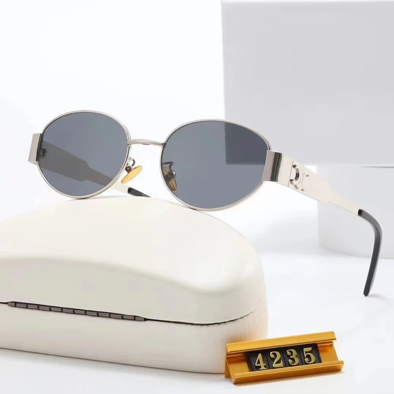 Elegante ovale Damen-Sonnenbrille mit goldfarbenem Rahmen Skanto