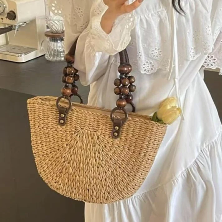 Trendige geflochtene Handtasche Skanto