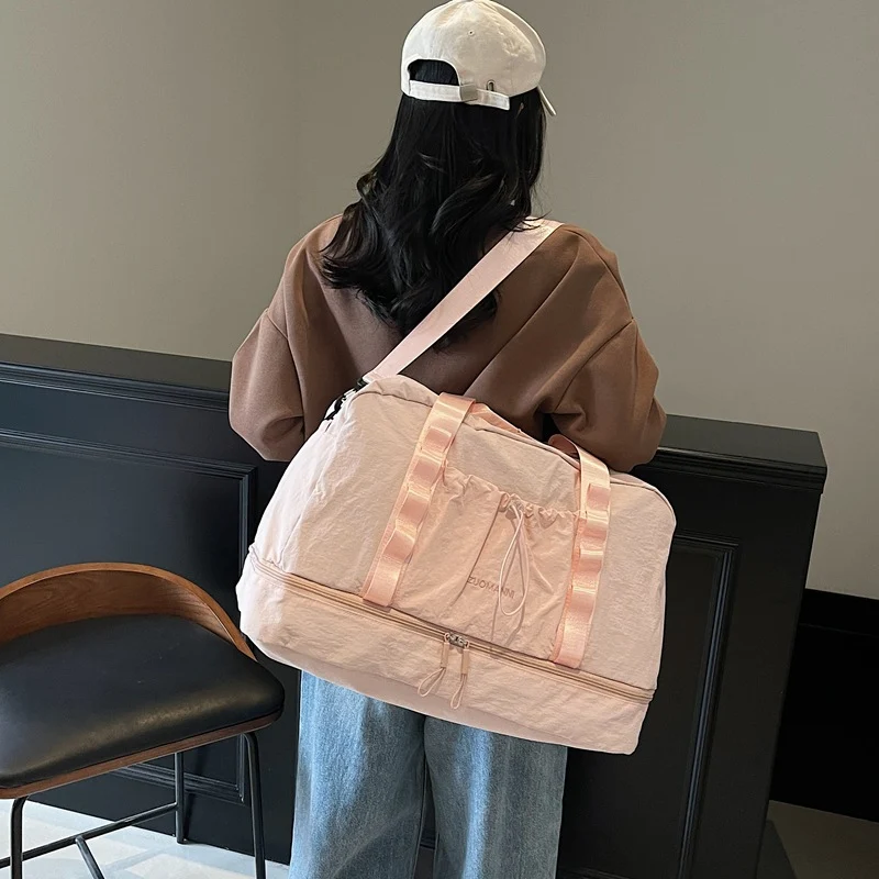 Sportliche Reisetasche für Damen mit innovativem Fächerlayout Skanto