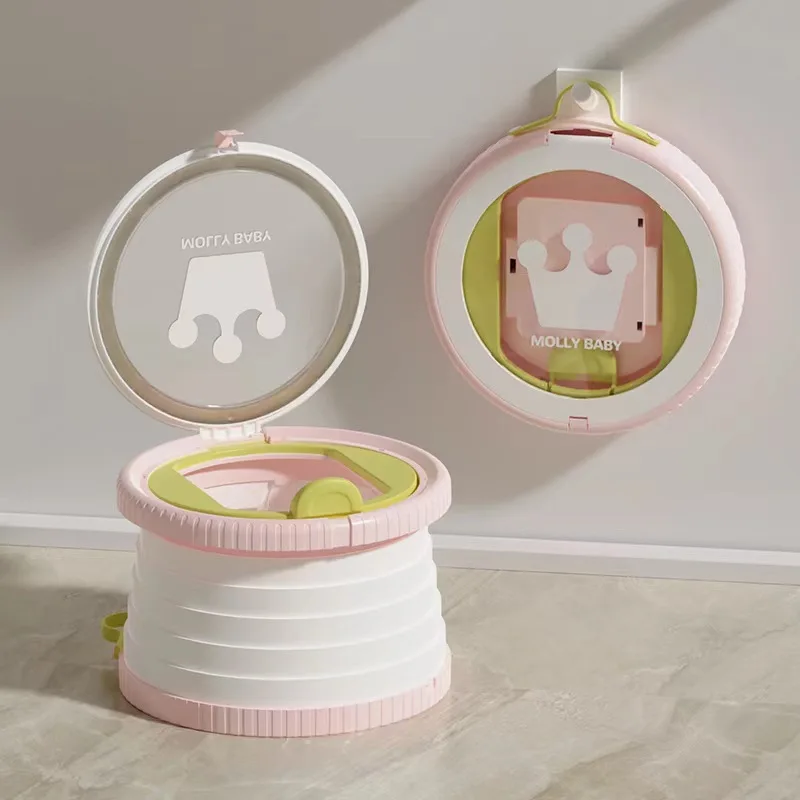 Skanto | Tragbarer, faltbarer Toilettensitz für Kinderreisen